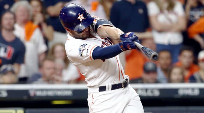 Oct 19, 2019; Houston, TX, USA; Houston Astros second baseman Jose Altuve (27) hits a 2-run walk off home run during the ninth inning against the New York Yankees in game six of the 2019 ALCS playoff baseball series at Minute Maid Park. Mandatory Credit: Troy Taormina-USA TODAY Sports